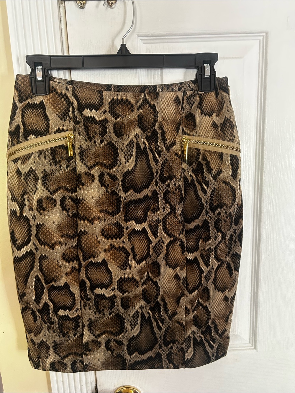 Michael Kors python-print pencil skirt featuring distinctive gold-tone side zip